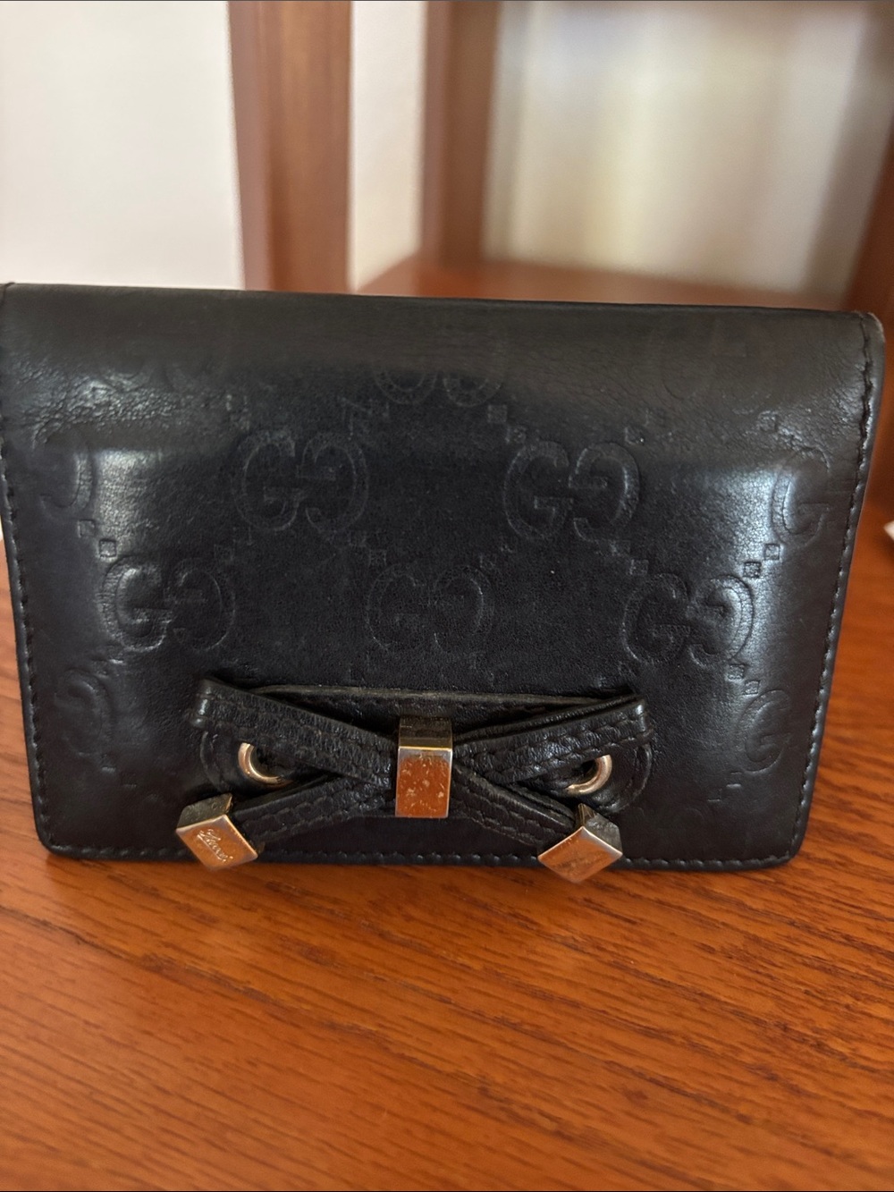 Gucci Black Embossed GG Bow Accent Compact Wallet